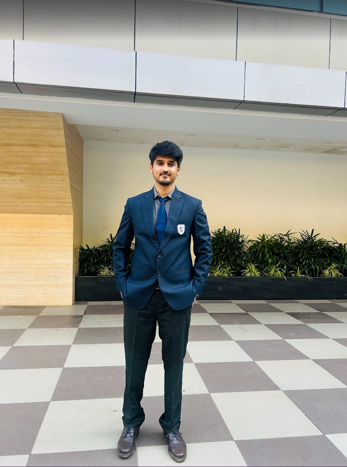 Portrait of Athar Sayed smiling